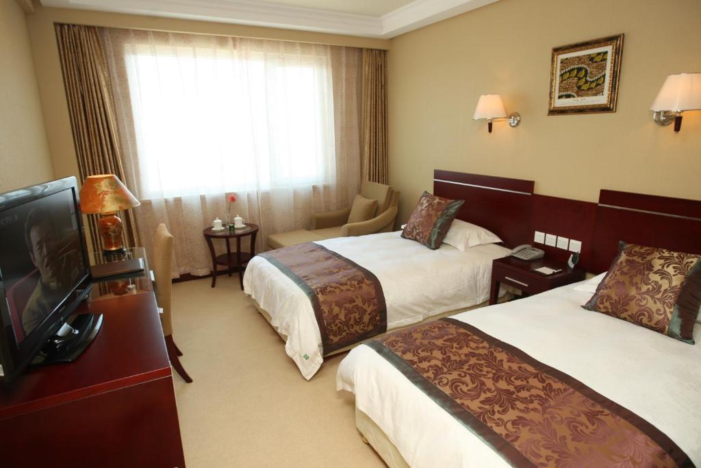 Overseas Chinese International Hotel Qingdao Eksteriør billede