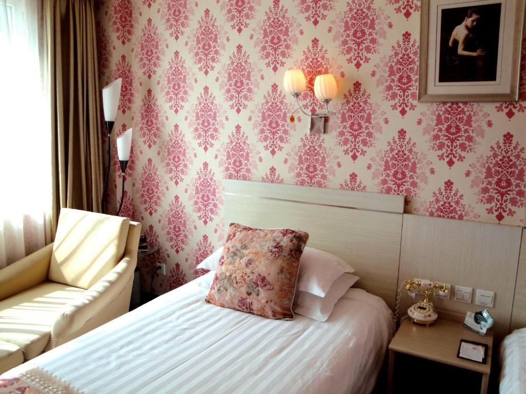 Overseas Chinese International Hotel Qingdao Værelse billede