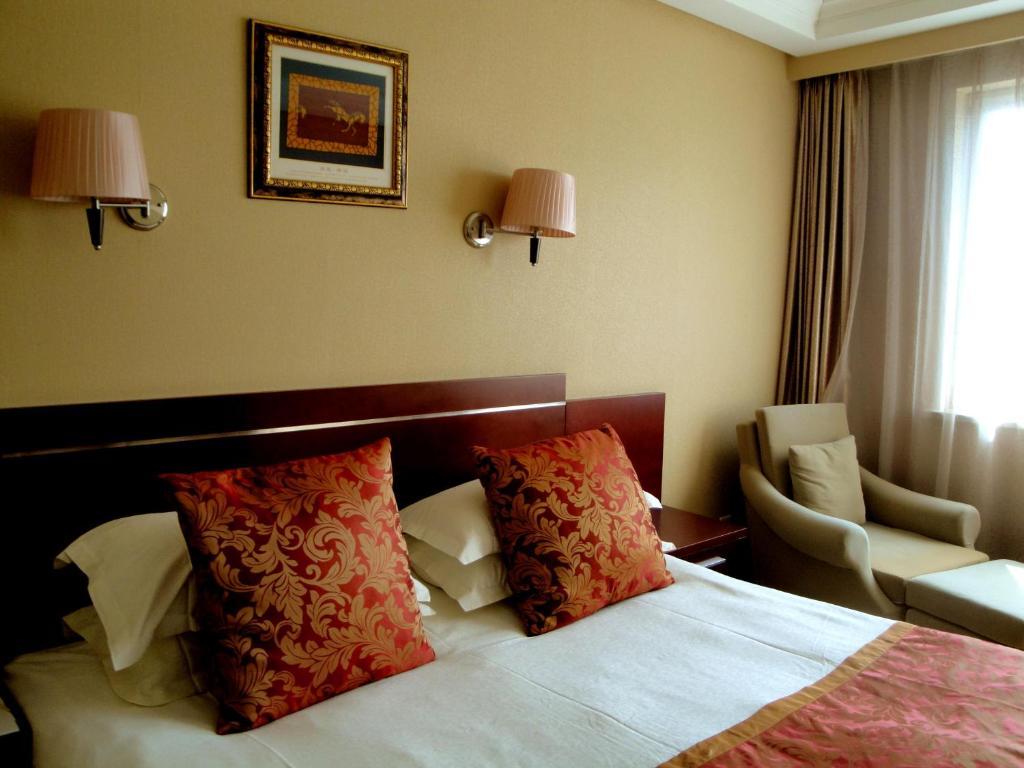 Overseas Chinese International Hotel Qingdao Værelse billede